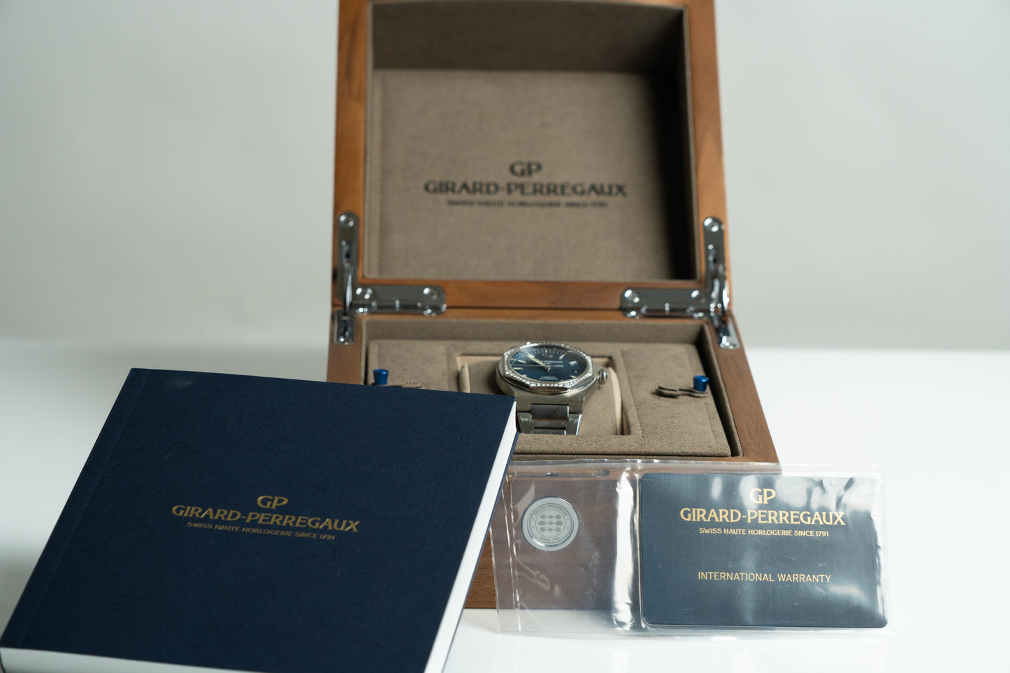 Girard Perregeaux "Laureato" 38mm, with factory diamond bezel.